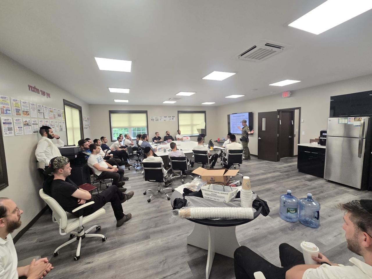 Classroom training session with NYSDEC instructor presenting to Chavivim SAR members